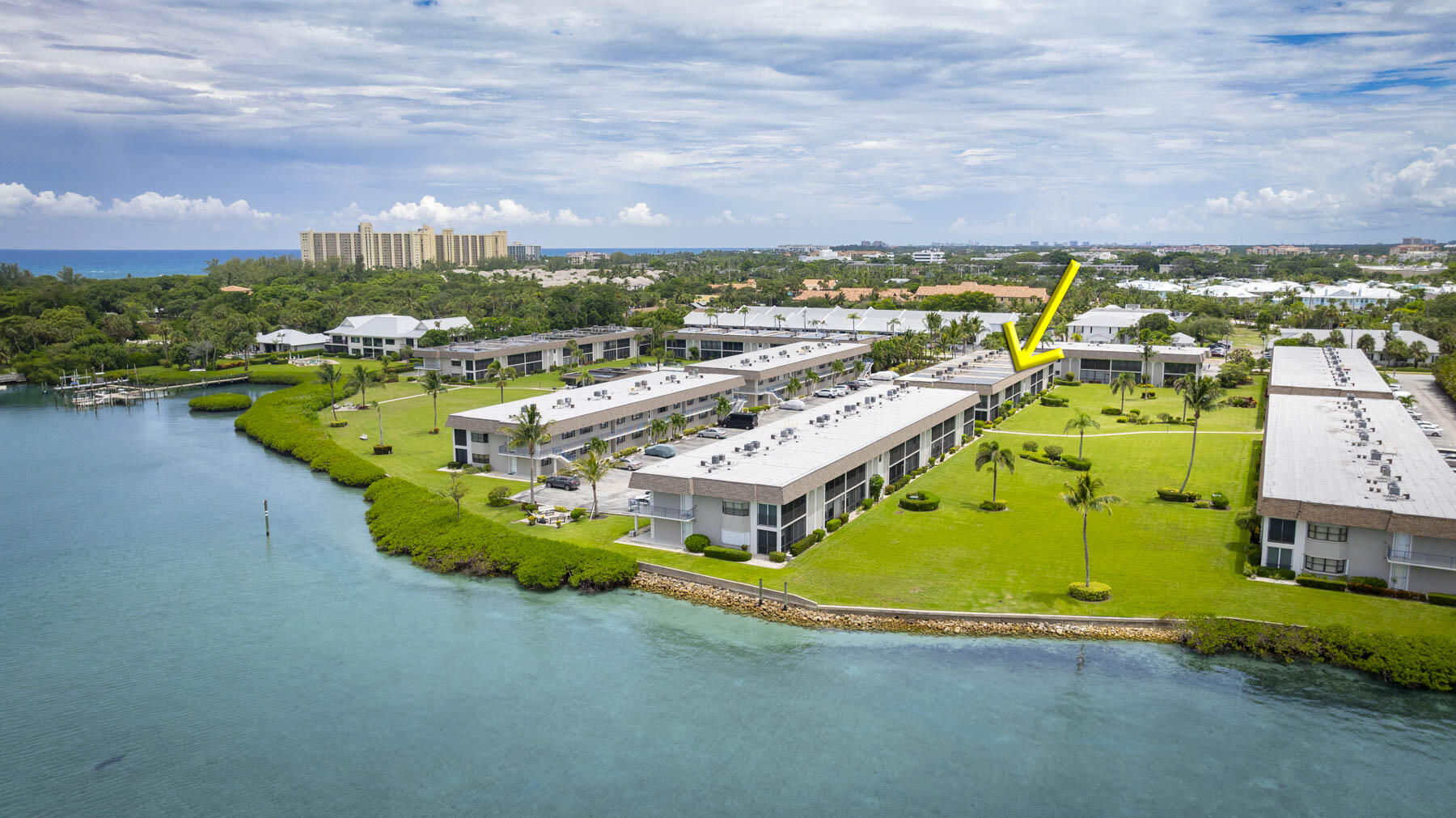 755 Saturn Street, Unit F203 Jupiter, FL 33477 - Photo 3 of 36 an aerial view of a house with a swimming pool