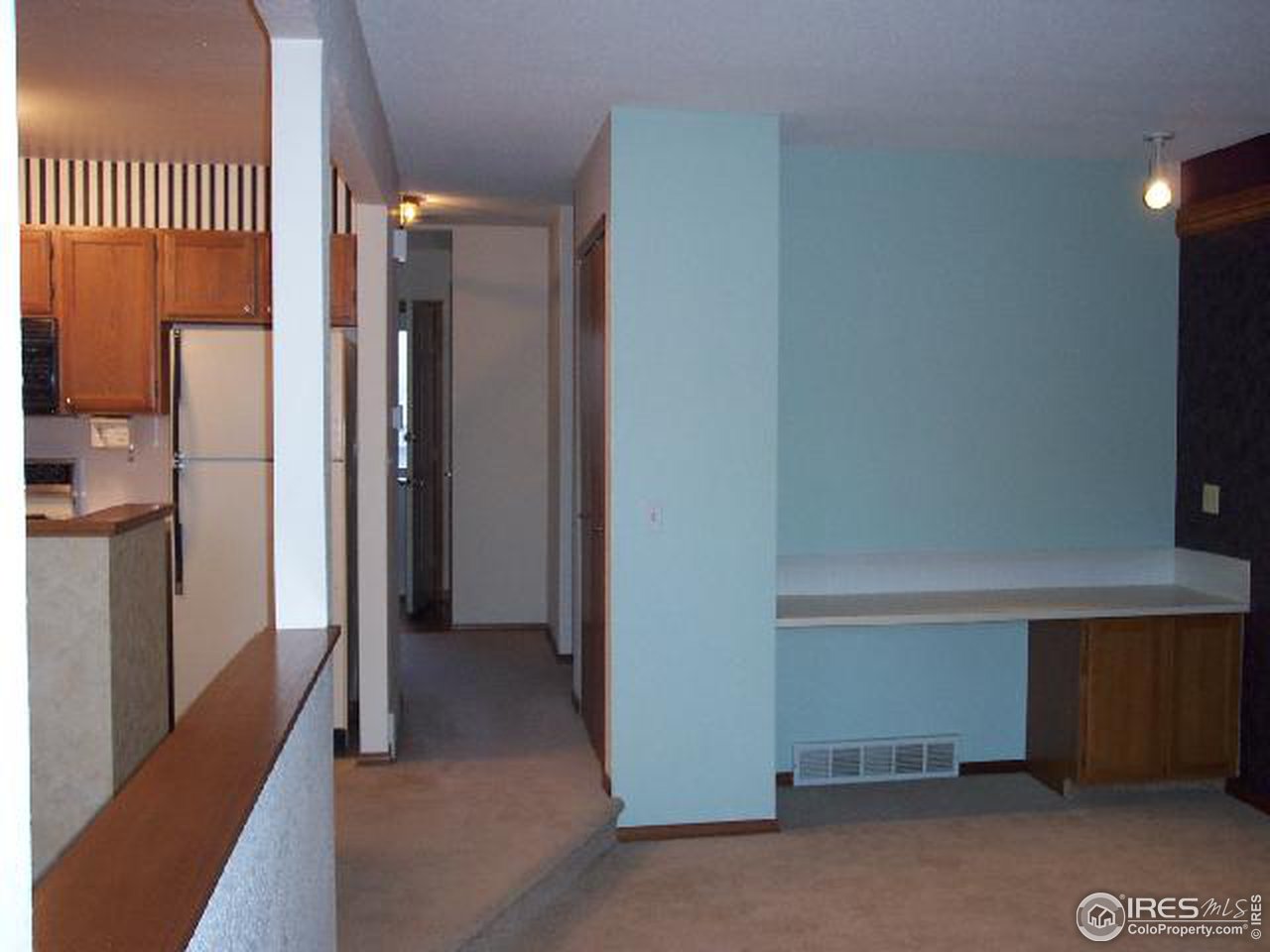 5809 West 18th Street Greeley, CO 80634 - Photo 7 of 11 a view of hallway with a hallway and a room