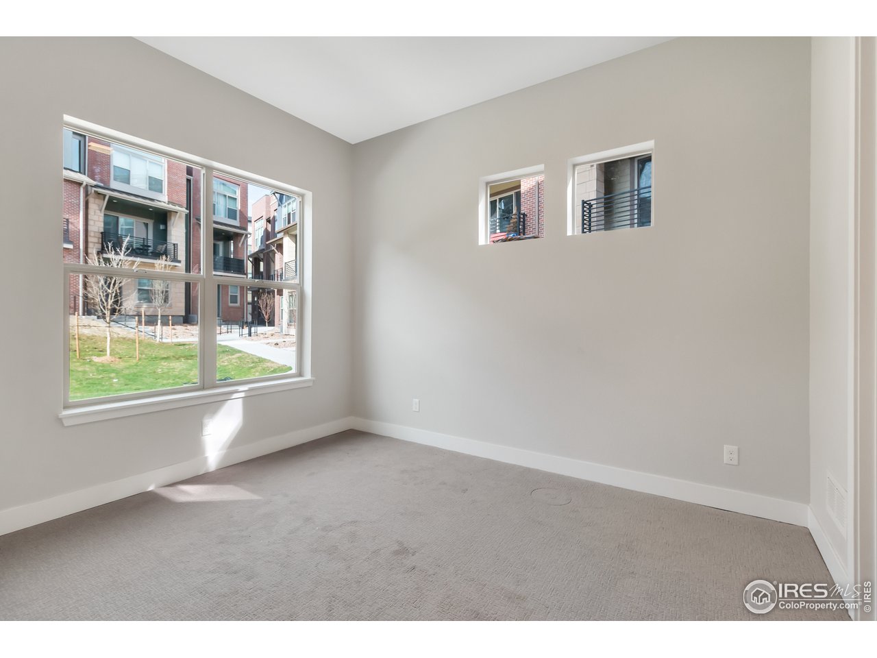 587 Canary Lane Superior, CO 80027 - Photo 11 of 22 a view of an empty room with a window