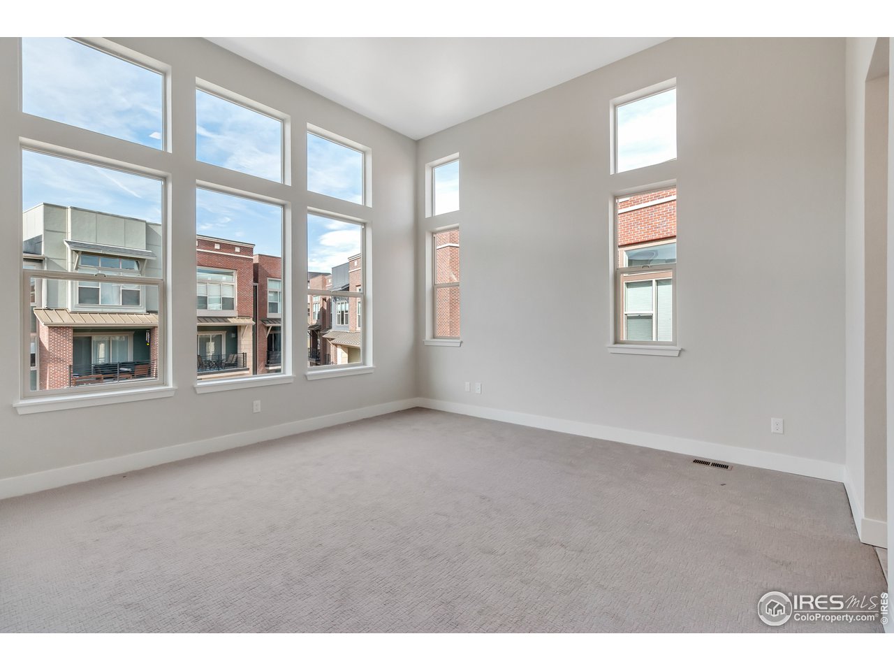 587 Canary Lane Superior, CO 80027 - Photo 13 of 22 a view of an empty room with a window