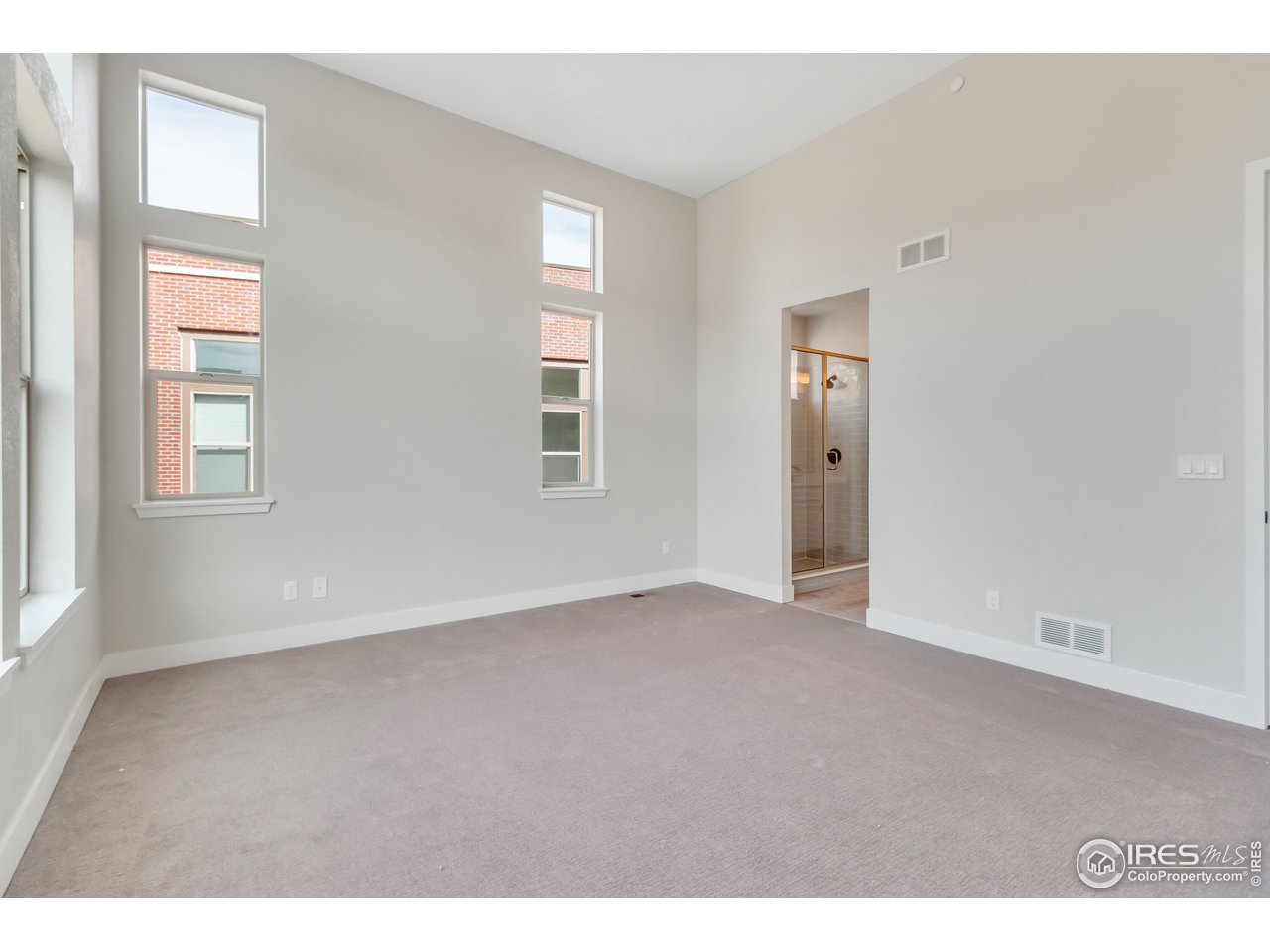 587 Canary Lane Superior, CO 80027 - Photo 15 of 22 an empty room with windows