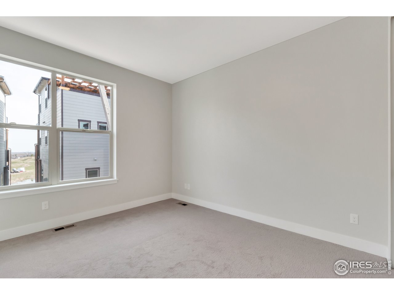 587 Canary Lane Superior, CO 80027 - Photo 16 of 22 an empty room with a window