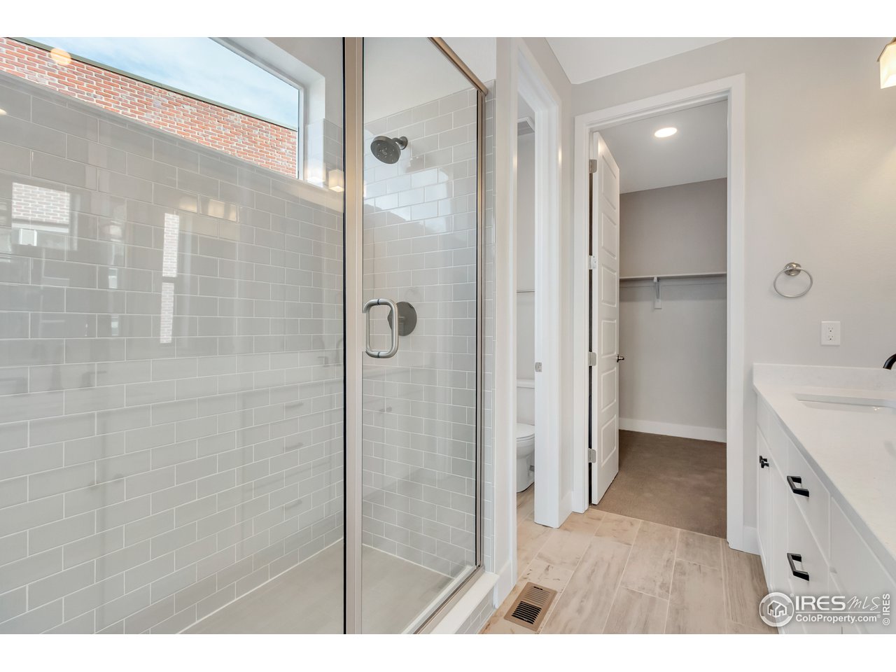 587 Canary Lane Superior, CO 80027 - Photo 17 of 22 a bathroom with a shower and a sink