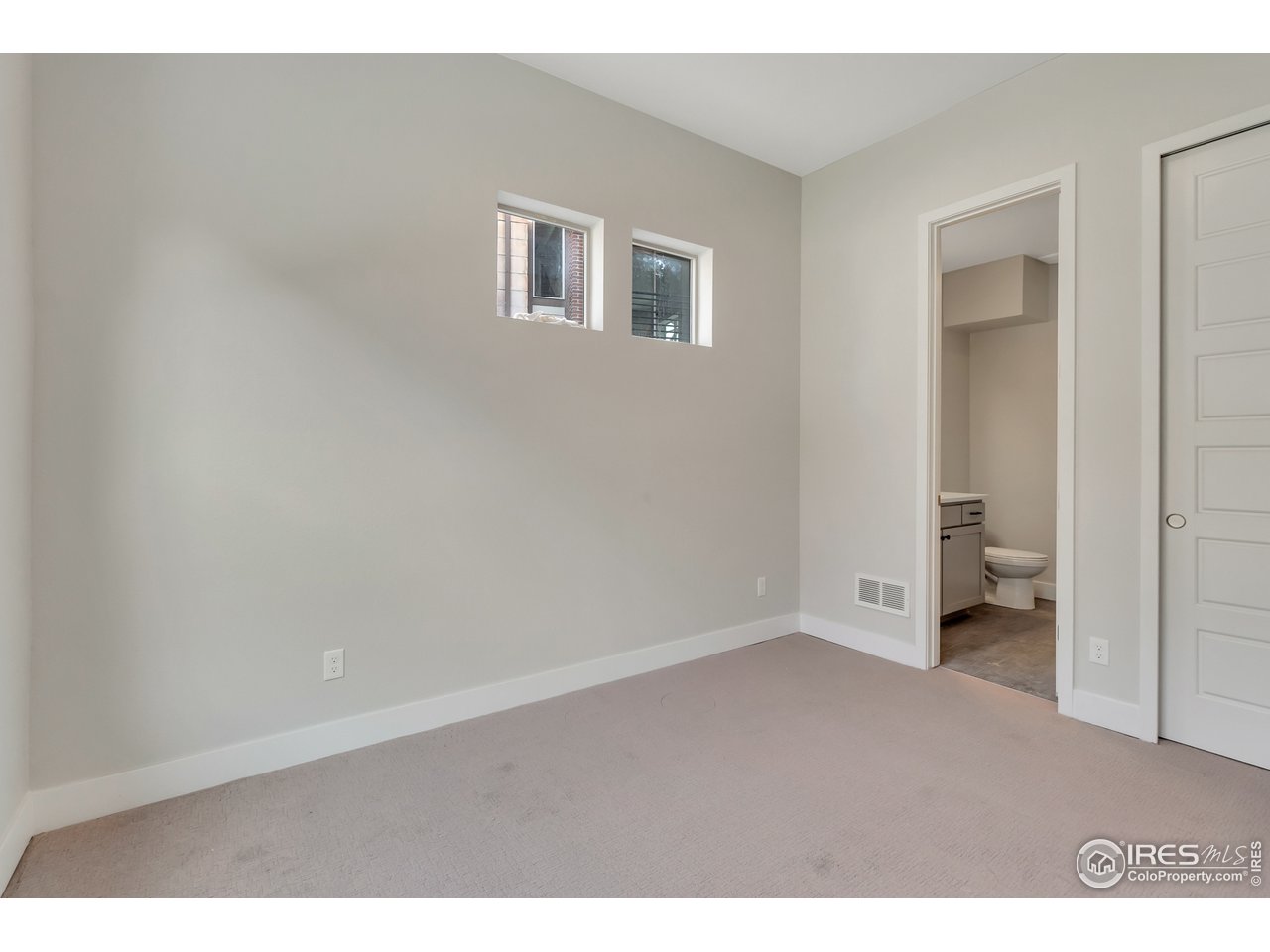 587 Canary Lane Superior, CO 80027 - Photo 8 of 22 a view of an empty room with a window