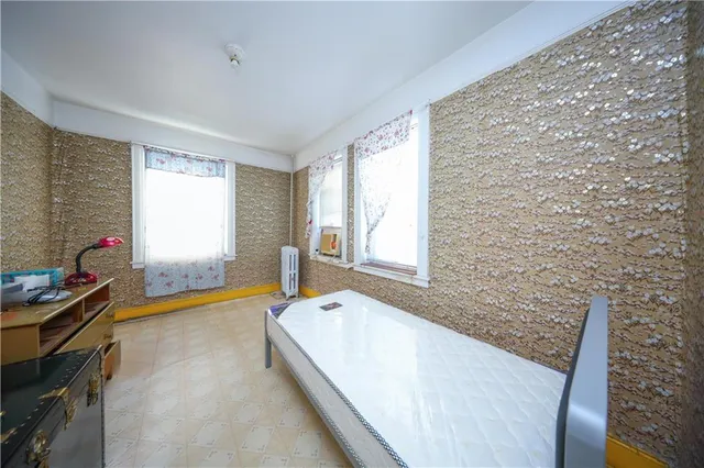 a bathroom with a sink a toilet and shower curtain