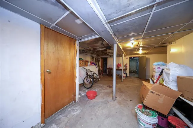 a bathroom with a sink toilet vanity and bathtub