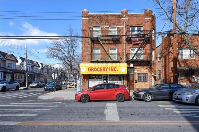 a view of a building with a street