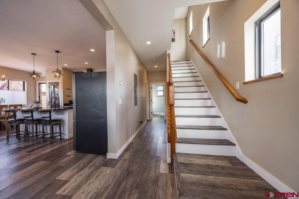 770 North Laura Street Ridgway, CO 81432 - Photo 13 of 45 a view of entryway and hall with wooden floor