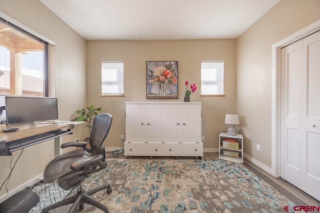 770 North Laura Street Ridgway, CO 81432 - Photo 21 of 45 a workspace with a desk and chair