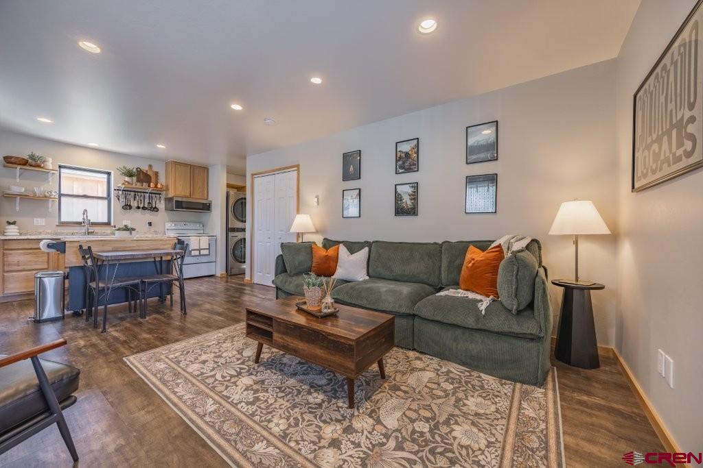770 North Laura Street Ridgway, CO 81432 - Photo 34 of 45 a living room with furniture and a rug
