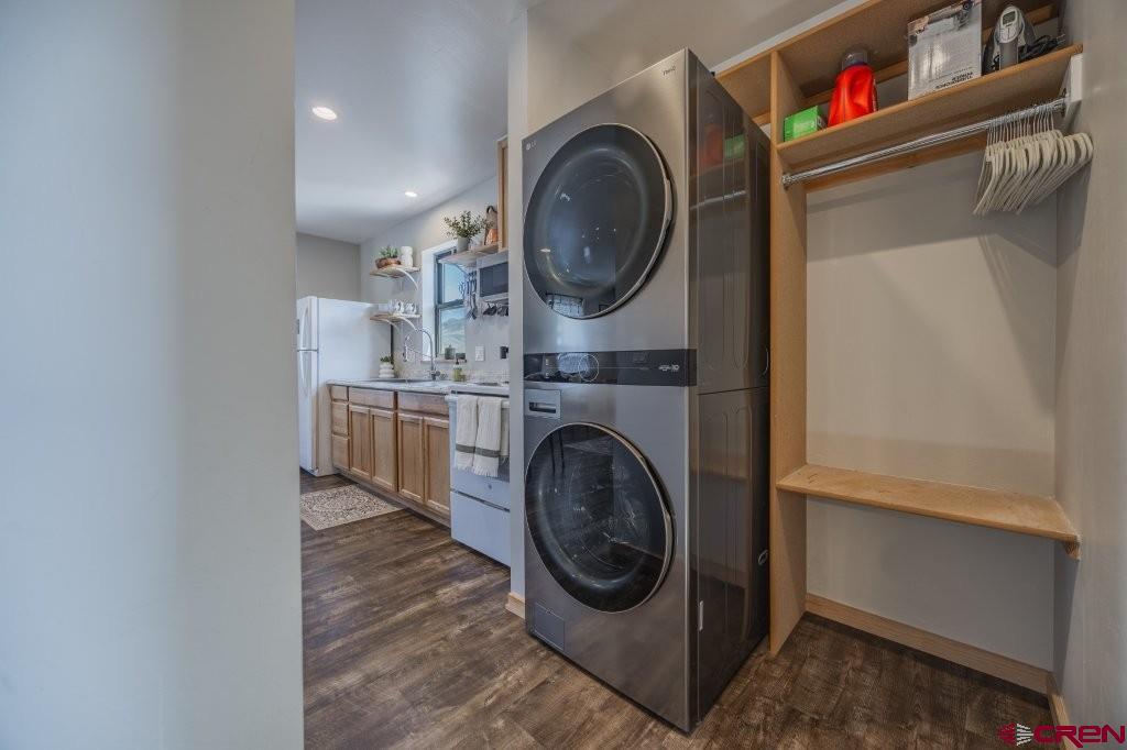 770 North Laura Street Ridgway, CO 81432 - Photo 38 of 45 a utility room with sink dryer and washer