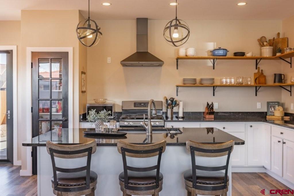 770 North Laura Street Ridgway, CO 81432 - Photo 7 of 45 a kitchen with lots of counter space and windows