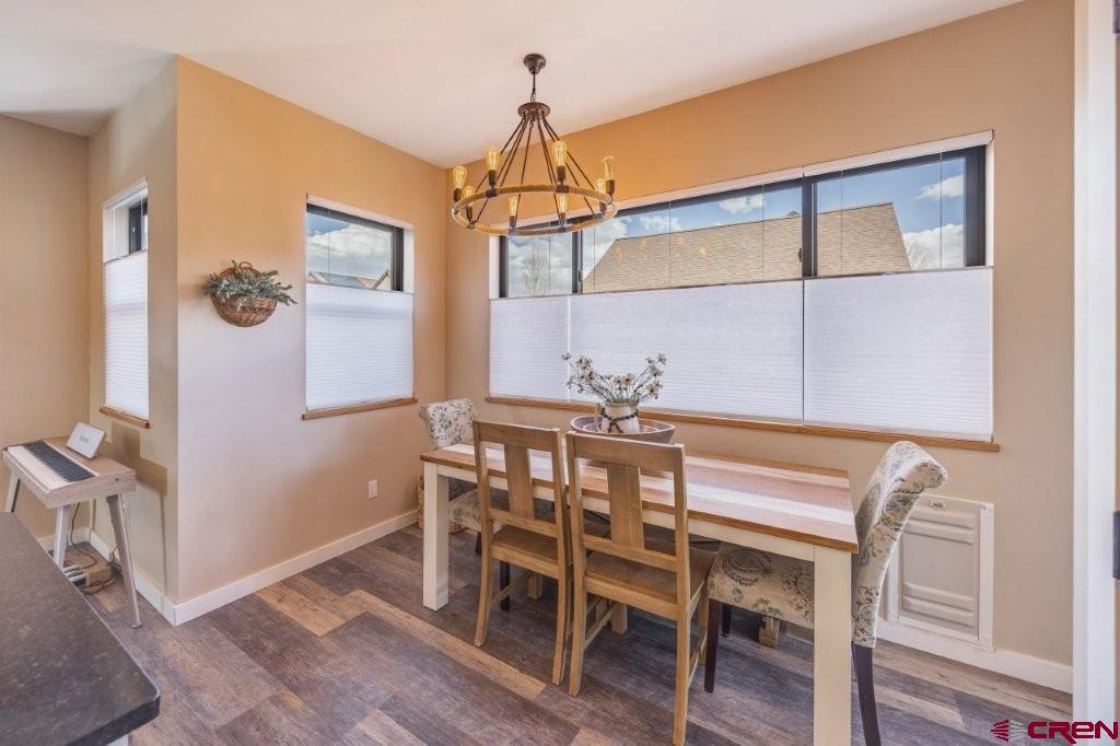 770 North Laura Street Ridgway, CO 81432 - Photo 9 of 45 a dining room with furniture and window