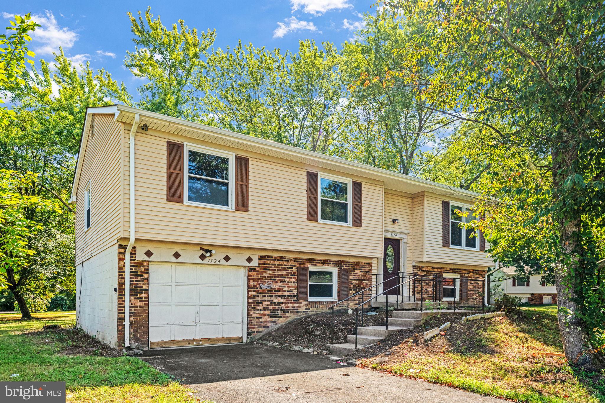 7124 Whetstone Road Alexandria, VA 22306 - Photo 2 of 39 Inviting curb appeal with front yard, driveway