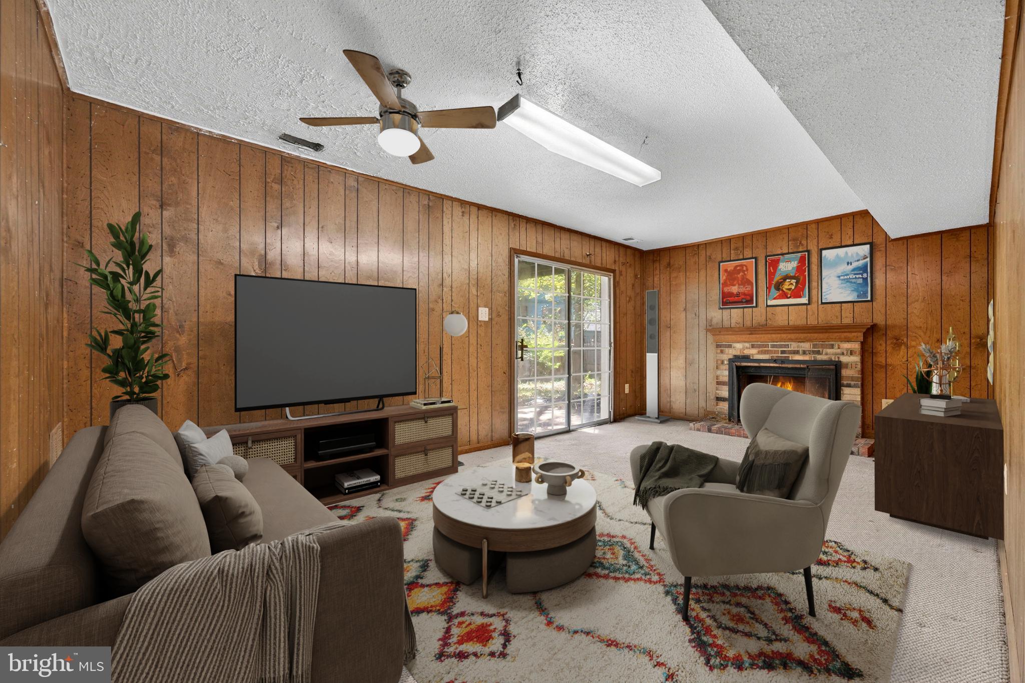 7124 Whetstone Road Alexandria, VA 22306 - Photo 25 of 39 Family Room: Wood-paneled with a brick fireplace