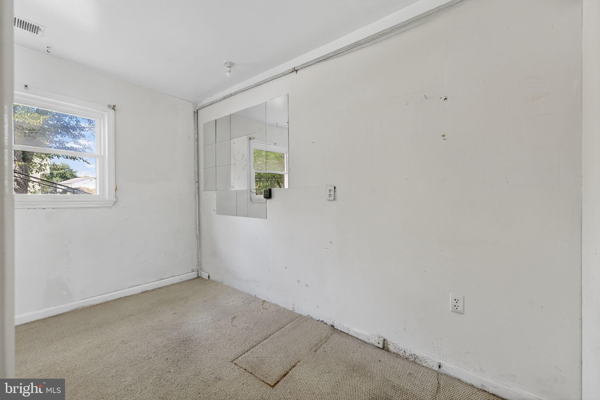 7124 Whetstone Road Alexandria, VA 22306 - Photo 30 of 39 Another spacious, empty room with a window