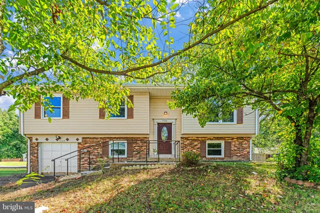 front view of a house with a big yard