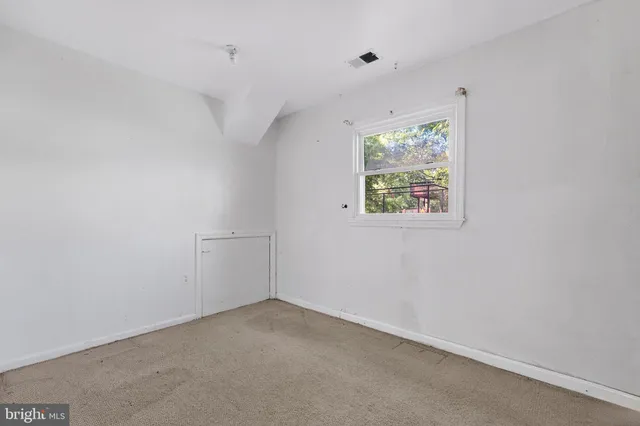 an empty room with closet