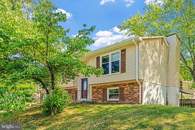 a view of a house with a big yard
