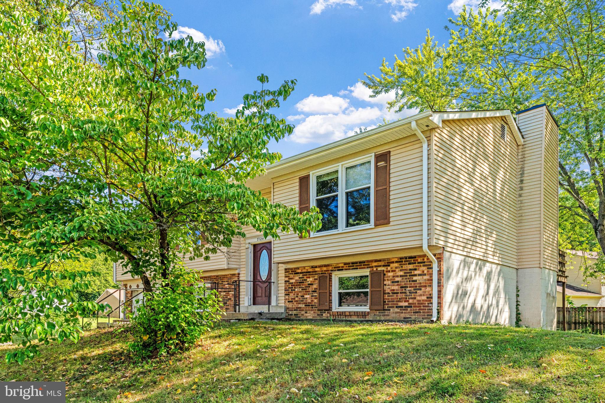 7124 Whetstone Road Alexandria, VA 22306 - Photo 35 of 39 House exterior with a large deck