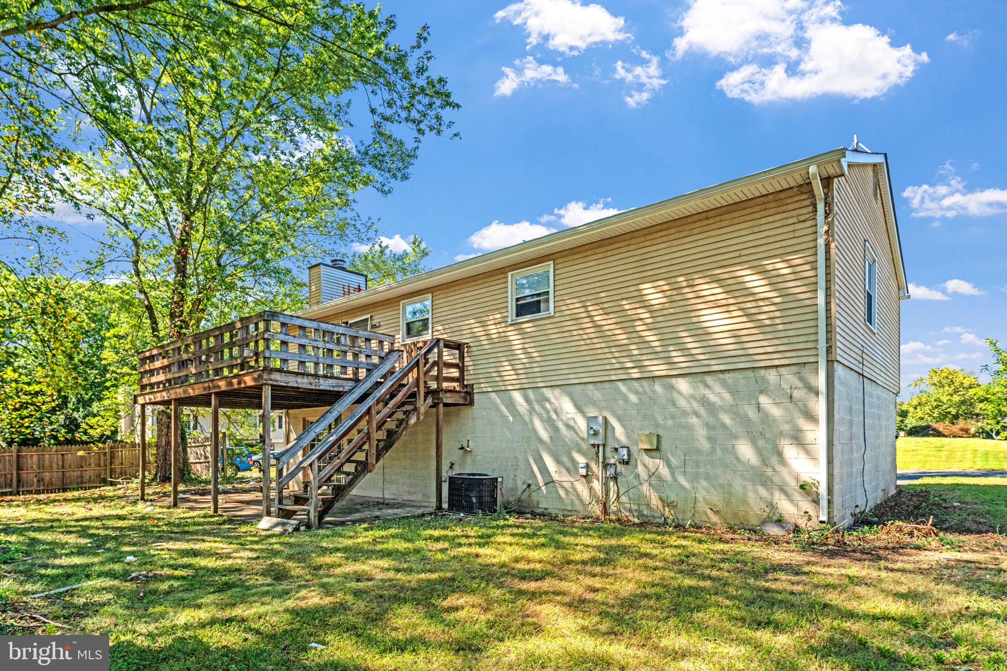7124 Whetstone Road Alexandria, VA 22306 - Photo 36 of 39 House exterior with a big backyard