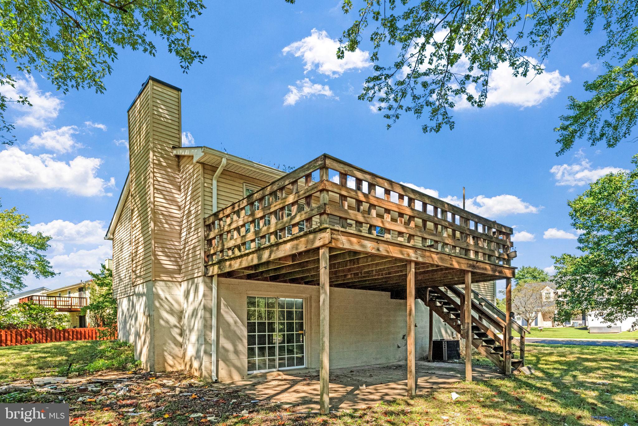7124 Whetstone Road Alexandria, VA 22306 - Photo 37 of 39 Side view of the house and deck