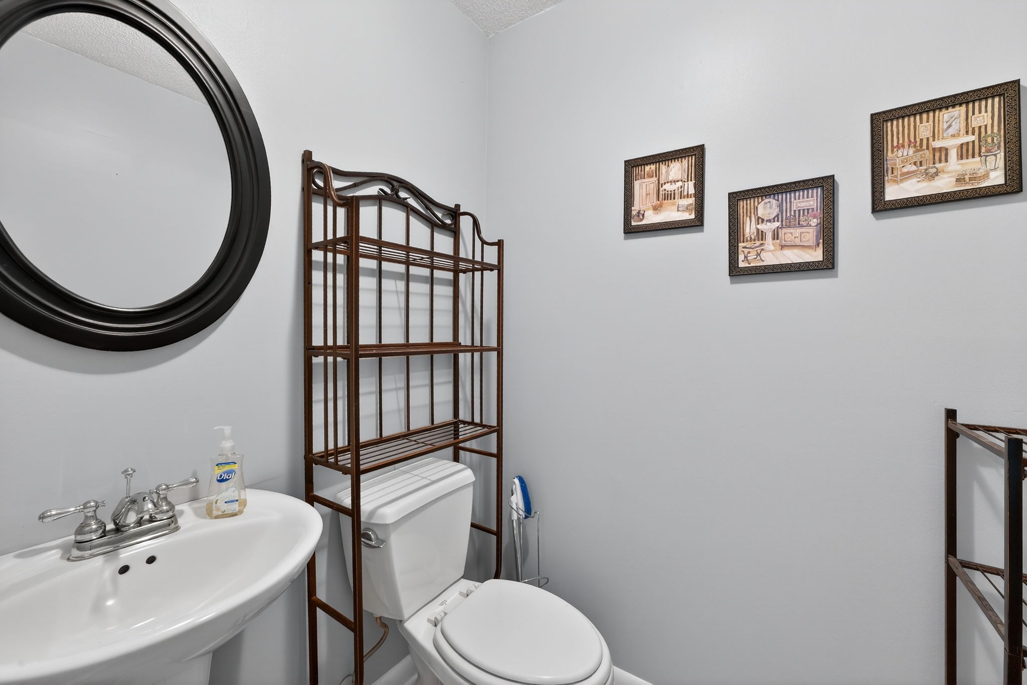 232 Loop Drive Winchester, TN 37398 - Photo 17 of 41 a bathroom with a toilet a sink and mirror