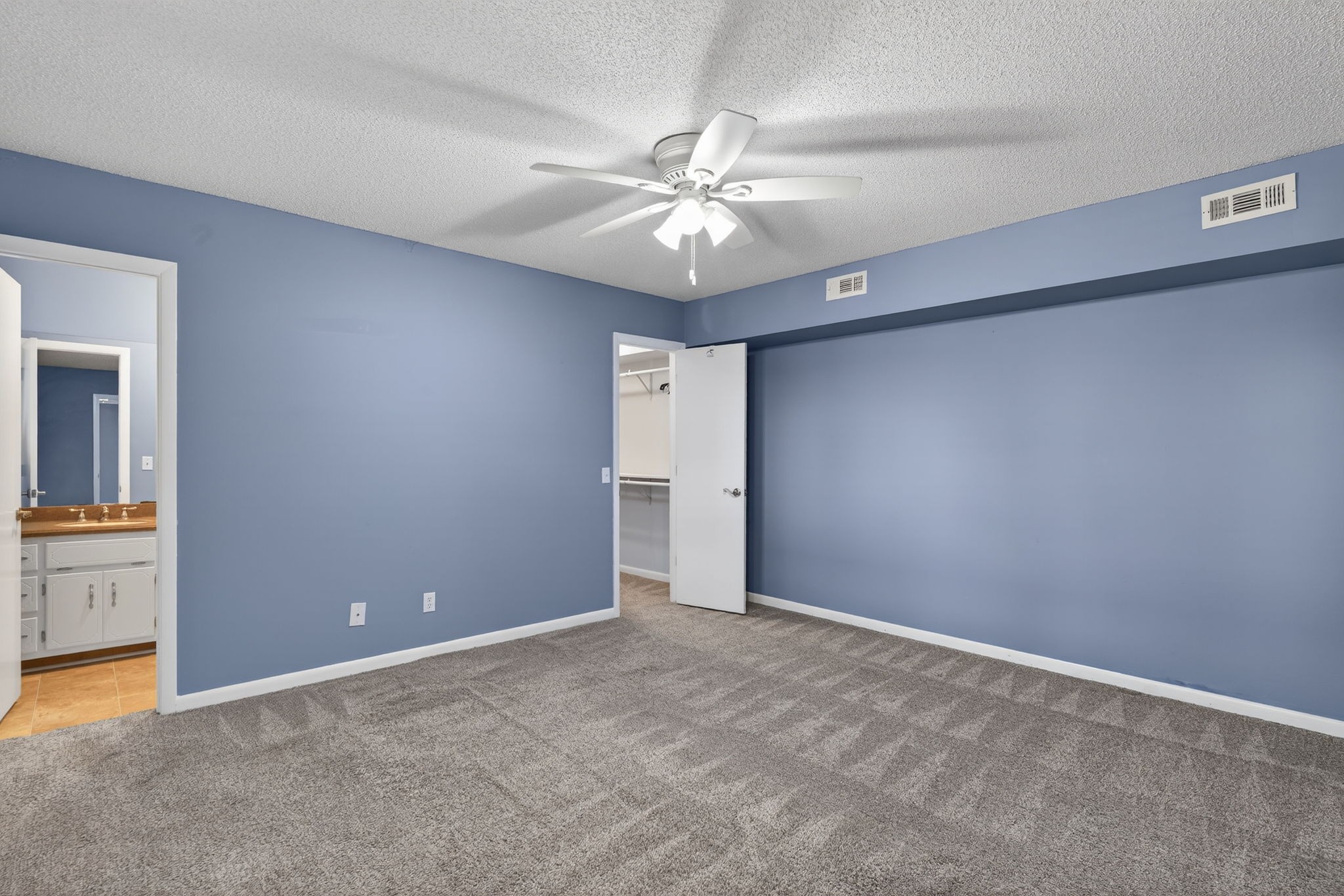 232 Loop Drive Winchester, TN 37398 - Photo 20 of 41 an empty room with closet and fan