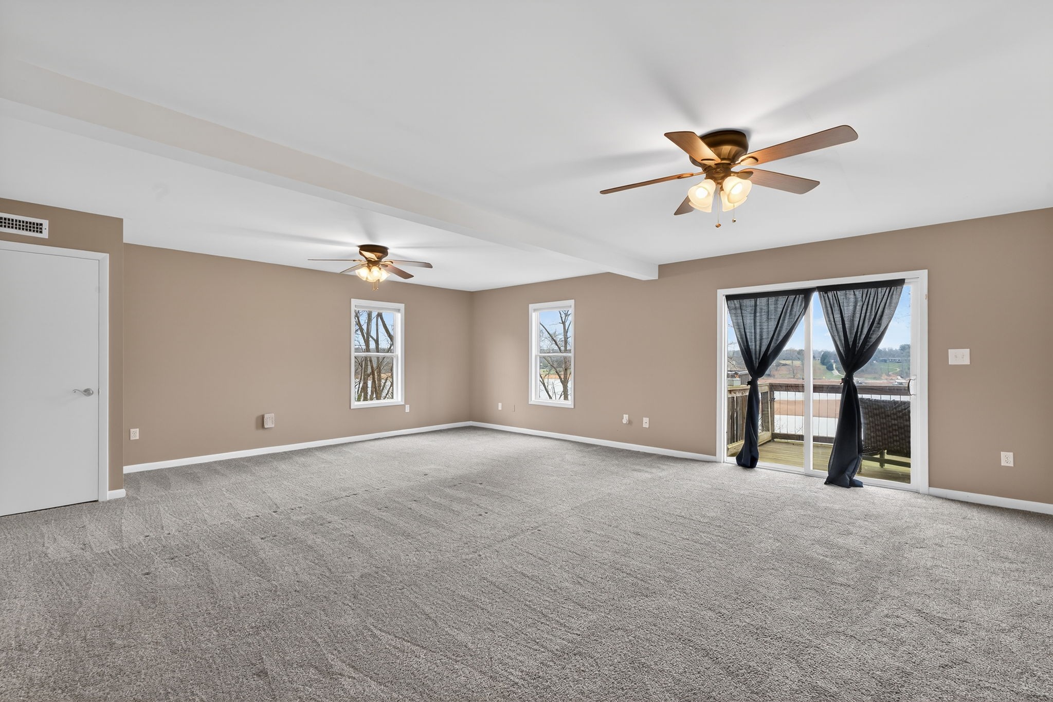 232 Loop Drive Winchester, TN 37398 - Photo 25 of 41 a view of a livingroom with a ceiling fan and window