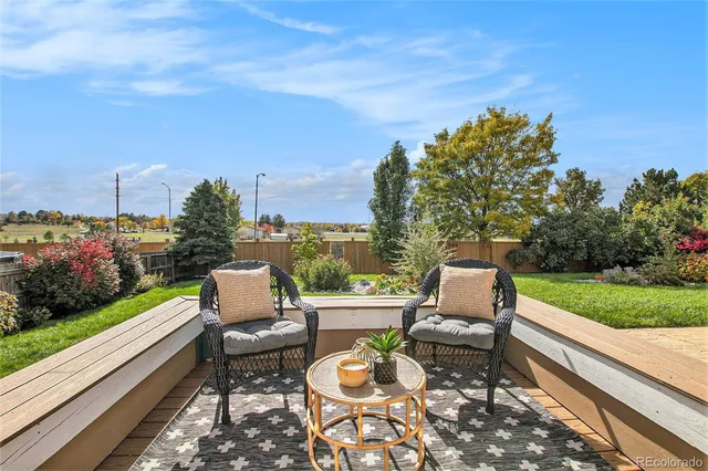 a sitting area with furniture and city view