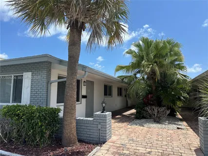 a view of a house with a patio
