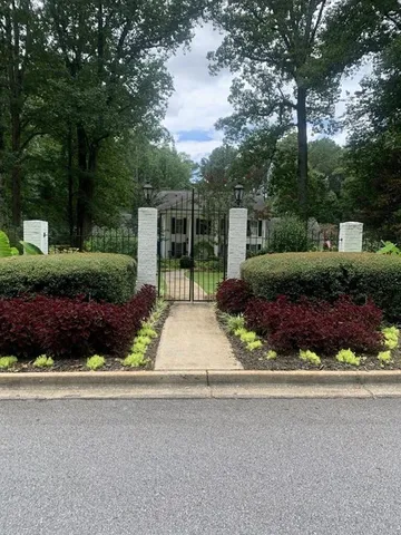 a house view with a garden space