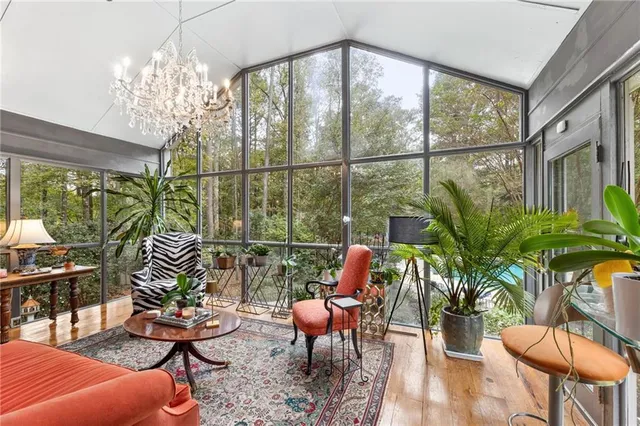 a bathroom with a double vanity sink mirror and shower