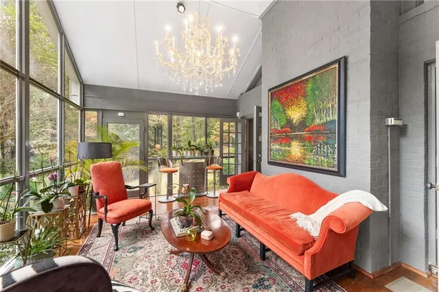 a bathroom with a shower toilet and a sink