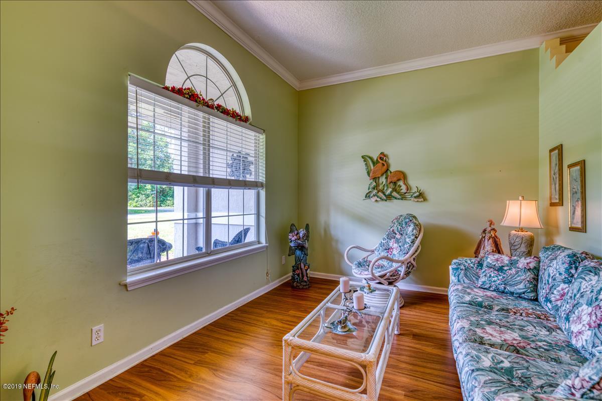 1372 Blackmon Road Green Cove Springs, FL 32043 - Photo 13 of 26 a living room with furniture