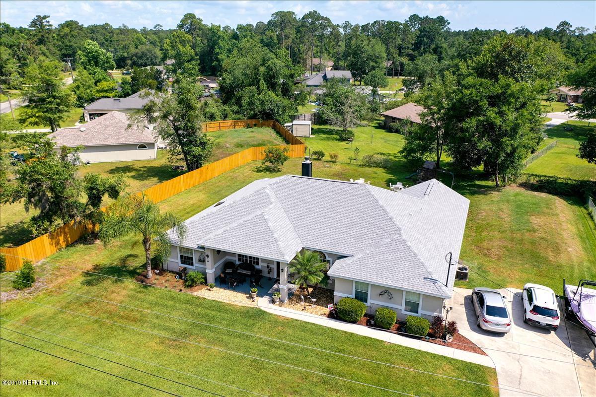 1372 Blackmon Road Green Cove Springs, FL 32043 - Photo 3 of 26 an aerial view of a house with pool patio and outdoor seating