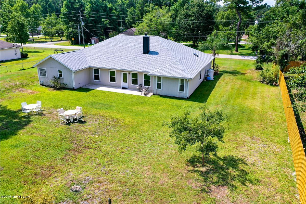 1372 Blackmon Road Green Cove Springs, FL 32043 - Photo 4 of 26 a aerial view of a house with swimming pool and deck