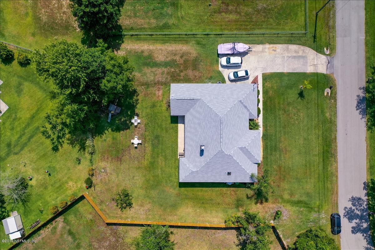 1372 Blackmon Road Green Cove Springs, FL 32043 - Photo 6 of 26 an aerial view of a house with a yard
