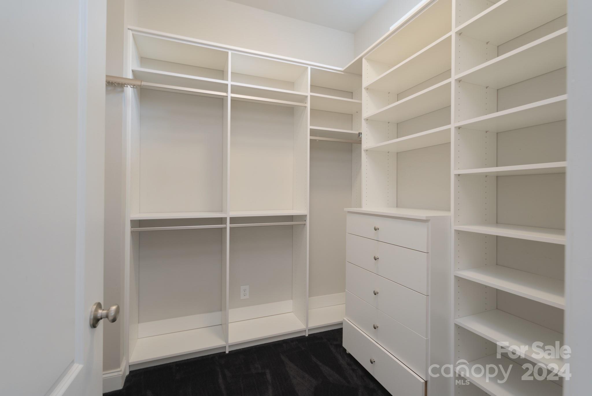 1385 Secret Path Drive Fort Mill, SC 29708 - Photo 26 of 48 a view of walk in closet with empty racks