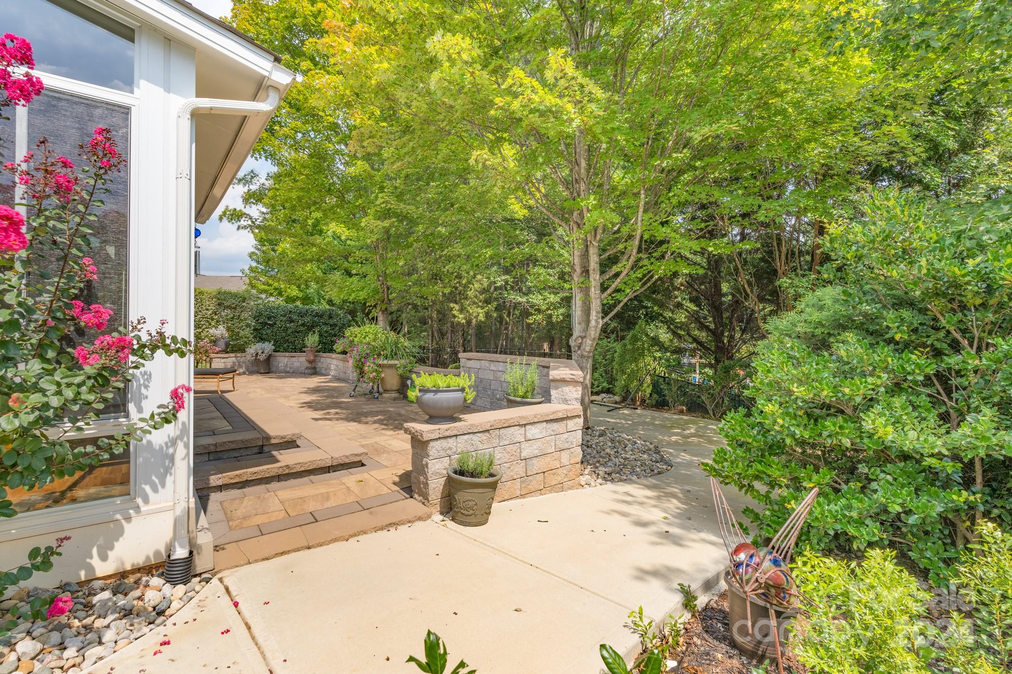 1385 Secret Path Drive Fort Mill, SC 29708 - Photo 36 of 48 a view of a backyard with sitting area