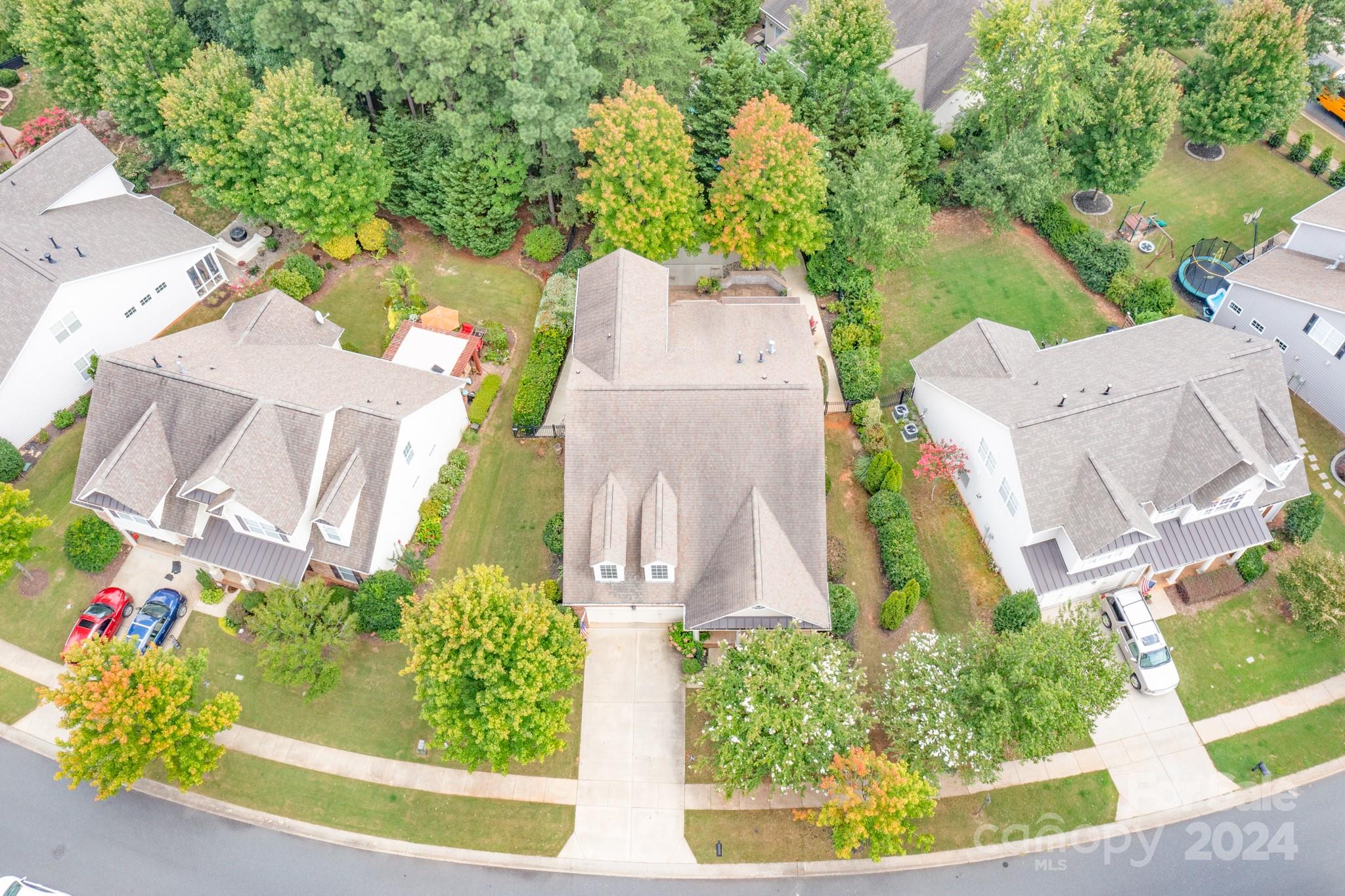 1385 Secret Path Drive Fort Mill, SC 29708 - Photo 44 of 48 an aerial view of a house with a garden and swimming pool