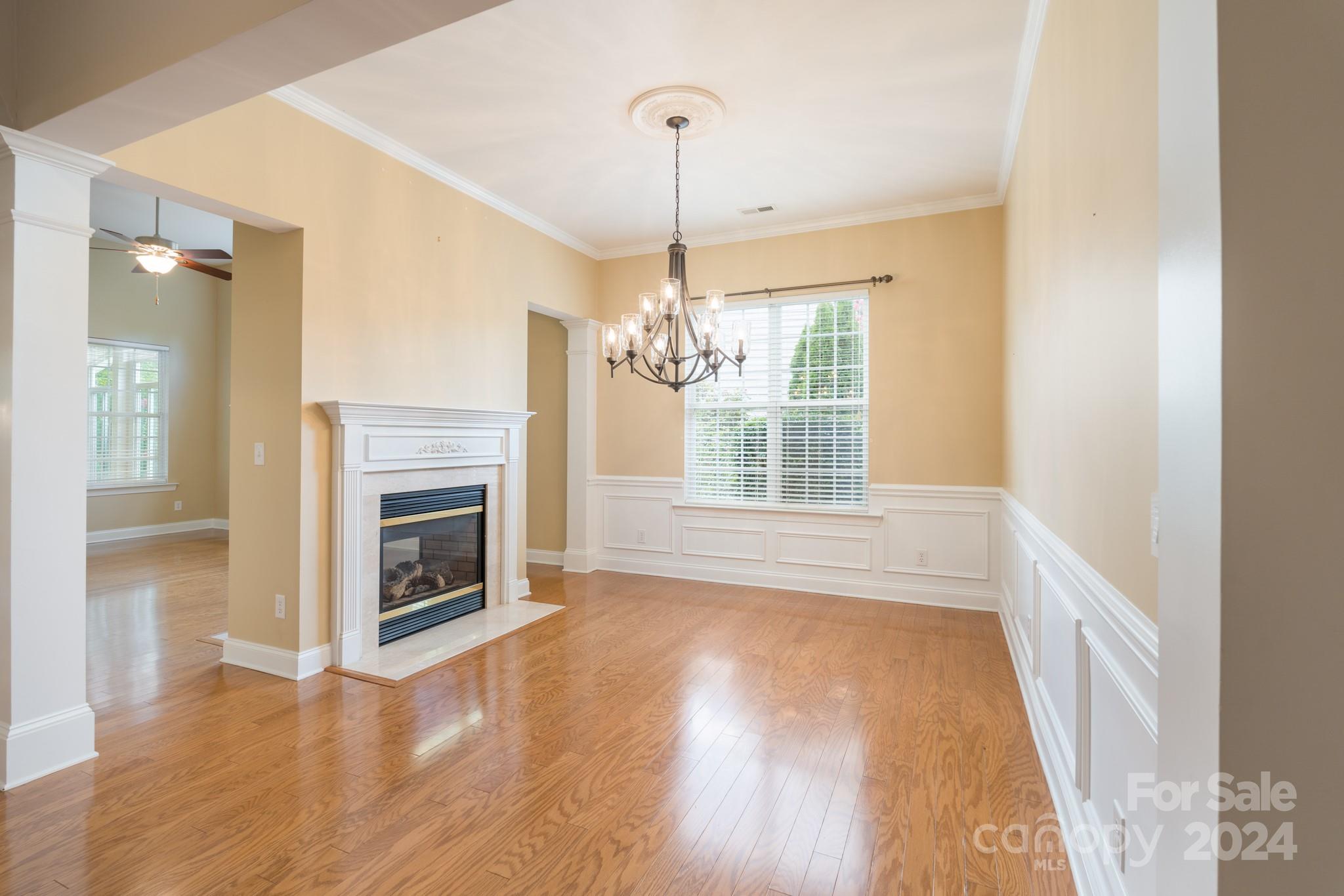 1385 Secret Path Drive Fort Mill, SC 29708 - Photo 10 of 48 a view of livingroom and kitchen with microwave