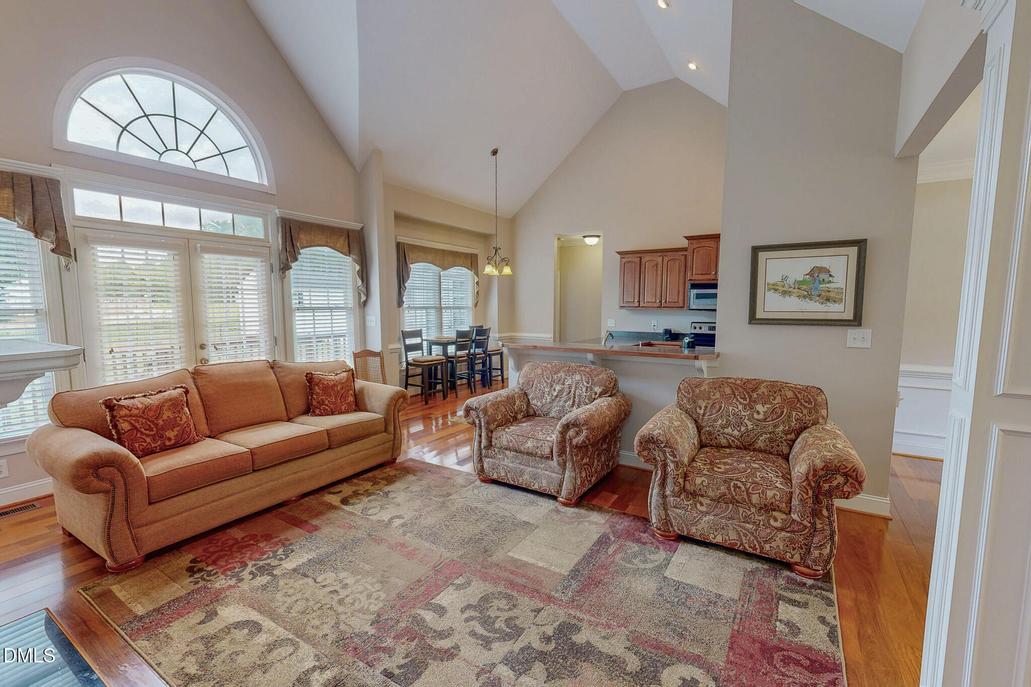 115 Duncan Plantation Road Timberlake, NC 27583 - Photo 27 of 48 a living room with furniture and a large window