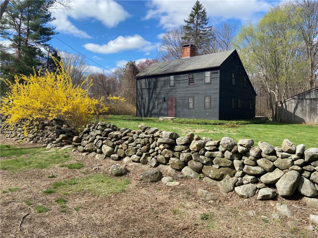 319 Durham Road Madison, CT 06443 - Photo 1 of 1 a view of a house with a yard