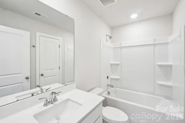a bathroom with a sink toilet bathtub and shower