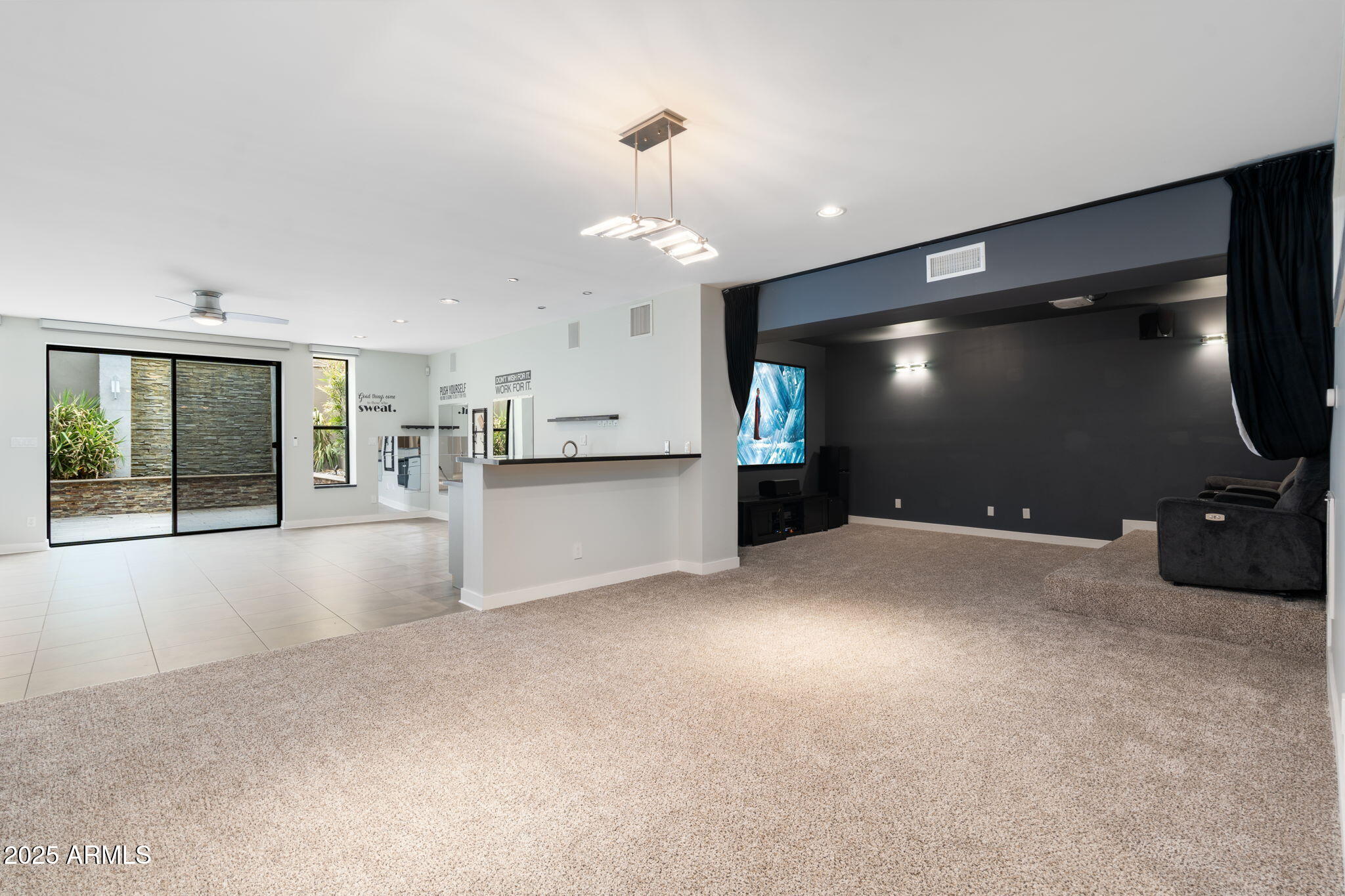 9433 South Stanley Place Tempe, AZ 85284 - Photo 26 of 47 a view of an empty room with a kitchen