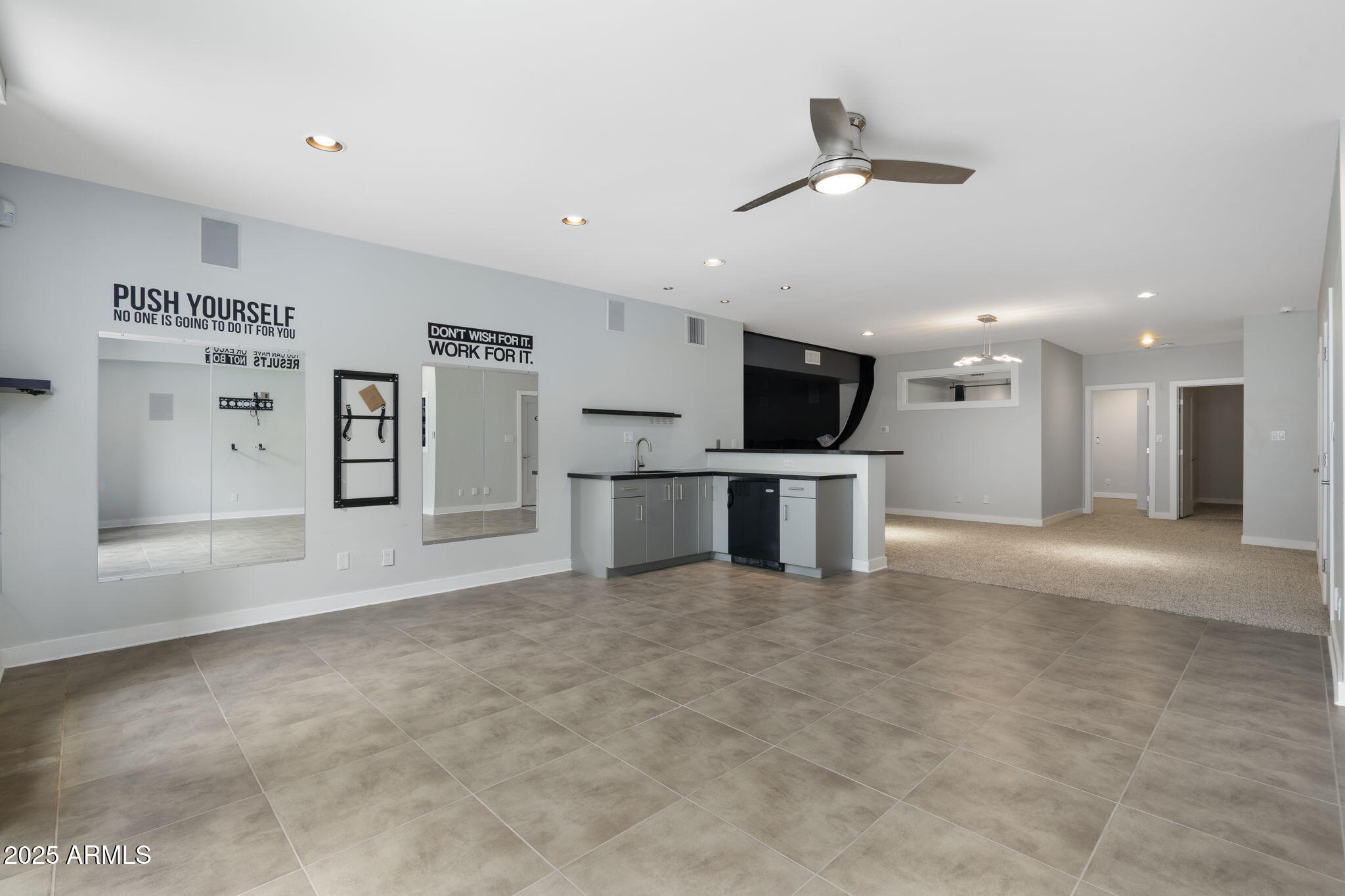 9433 South Stanley Place Tempe, AZ 85284 - Photo 27 of 47 a view of kitchen with a sink wooden cabinets and a kitchen