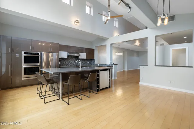 a workspace with furniture and wooden floor