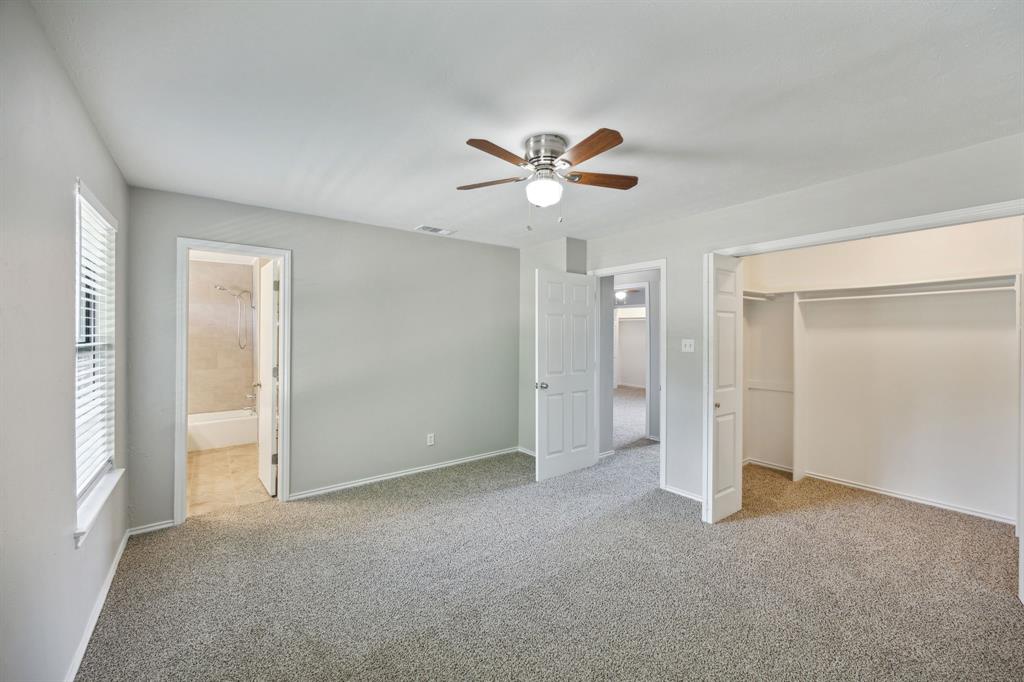 2420 Lakeview Circle McKinney, TX 75072 - Photo 13 of 25 a view of room with a ceiling fan and a window