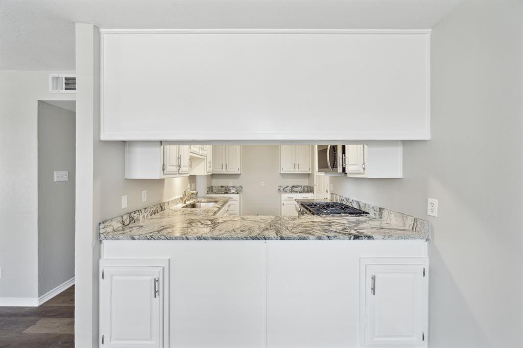 2420 Lakeview Circle McKinney, TX 75072 - Photo 17 of 25 a bathroom with a granite countertop sink and a mirror